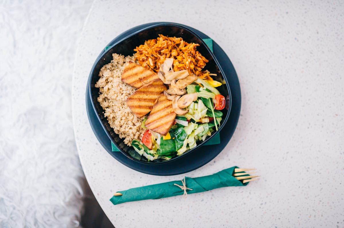 Quinoa in a bowl on a light background
